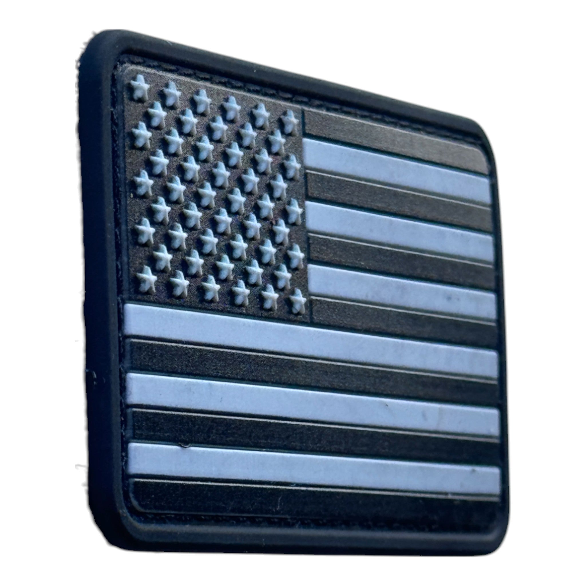 Black in black USA Flag on tactical military 3D PVC Hook and loop patch. Side view