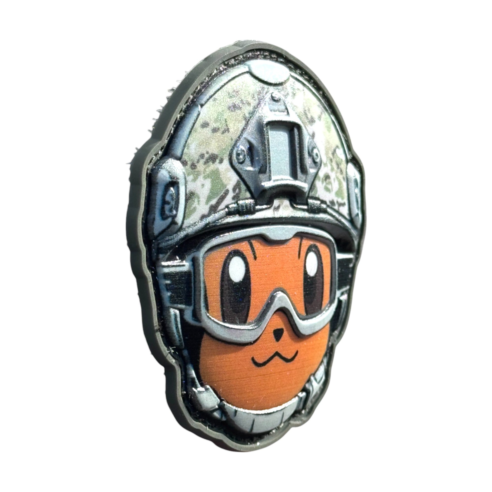 Orange face emoji wearing a combat helmet on a tactical military 3D PVC Hook and loop patch. Side View. Ideal for adding a unique and fun touch to your gear.