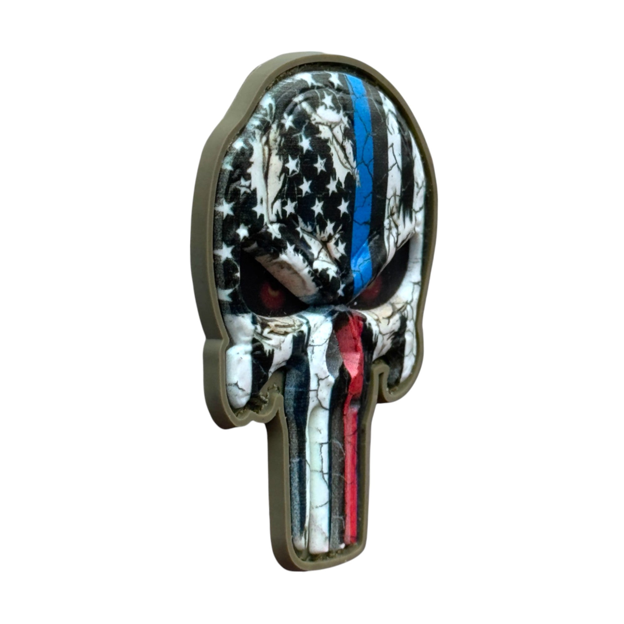 Punisher Skull with red, blue, white and black USA flag camo on a tactical military 3D PVC Hook and loop patch. Side view. Ideal for adding a unique and fun touch to your gear.