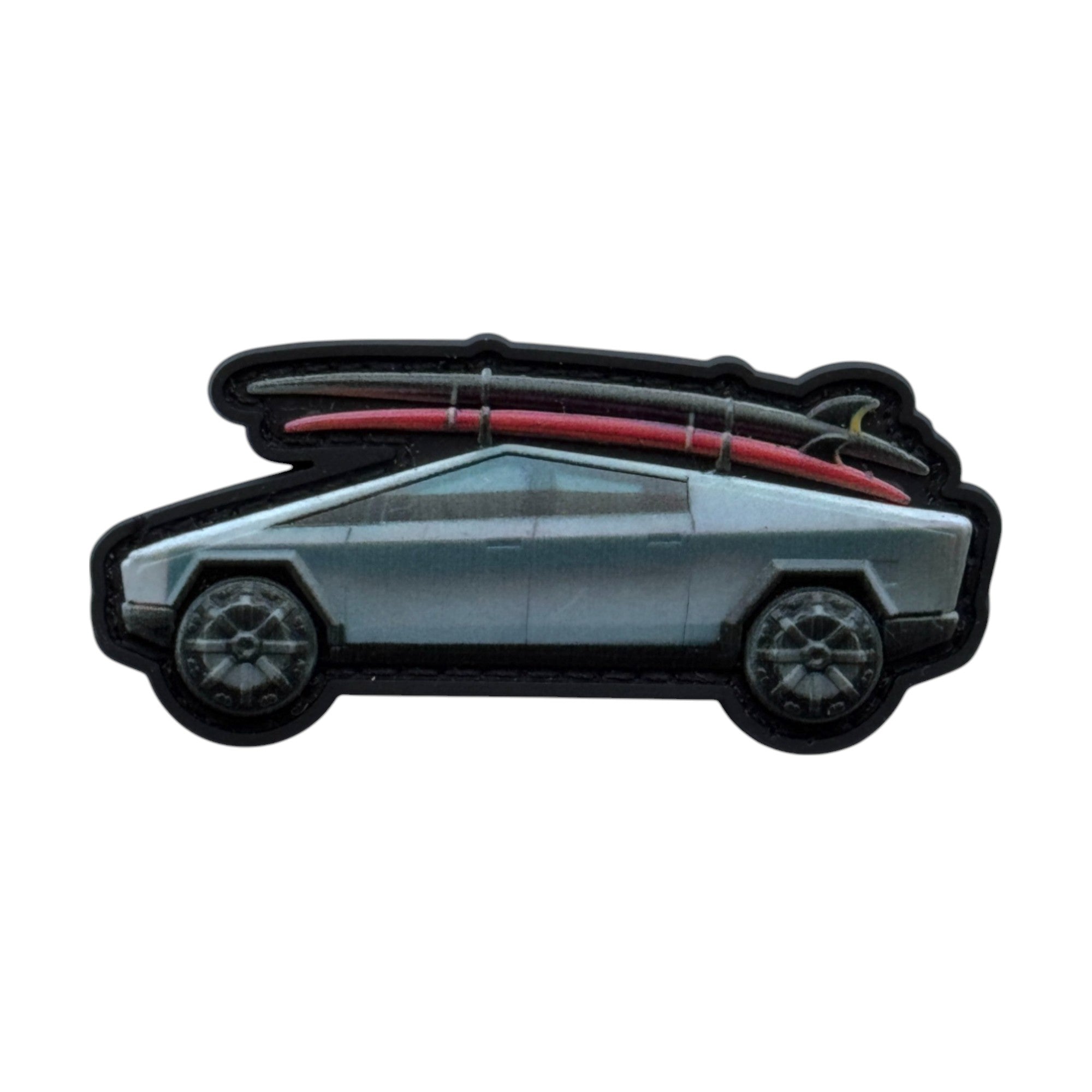 Silver Cybertruck with surfboards on top. 3D PVC Velcro patch with hook and loop backing.