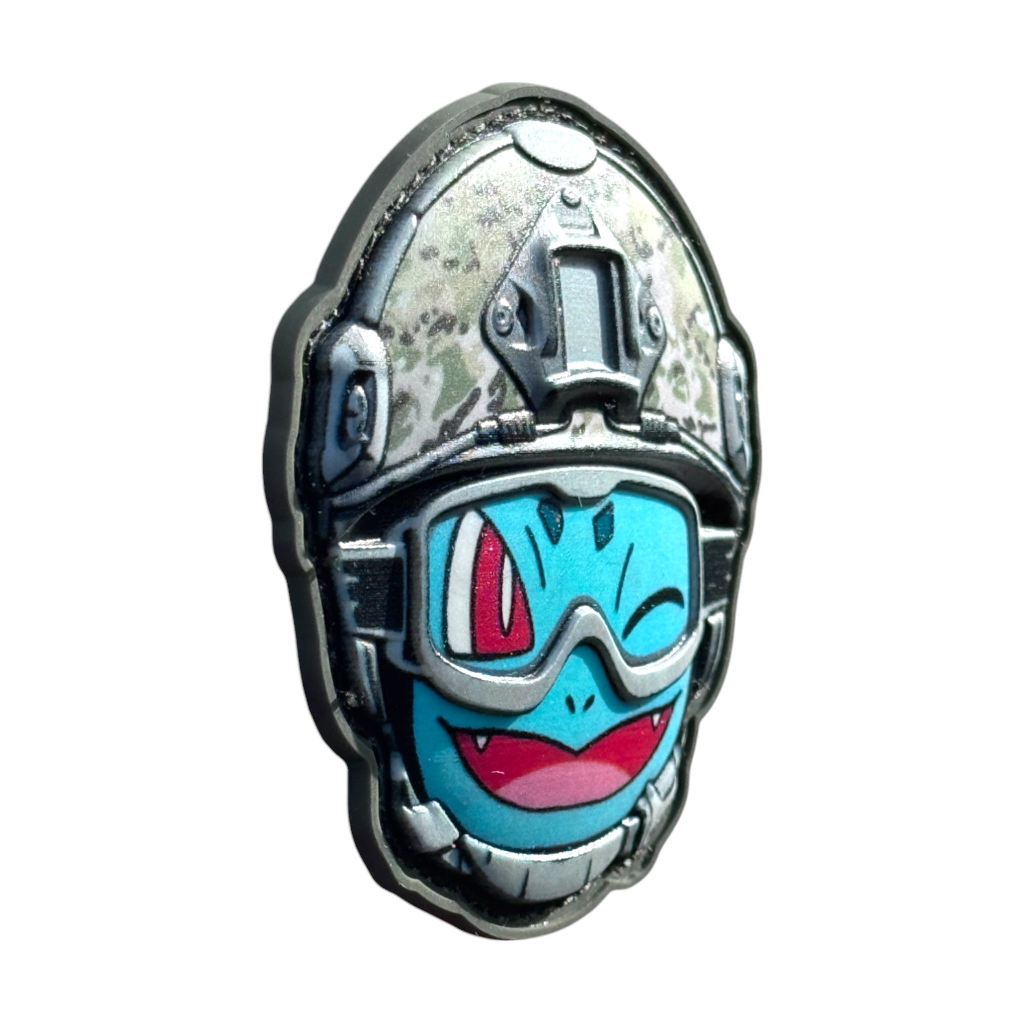 Sky blue winking emoji wearing a combat helmet on a tactical military 3D PVC Hook and loop patch. Side view. Ideal for adding a unique and fun touch to your gear.