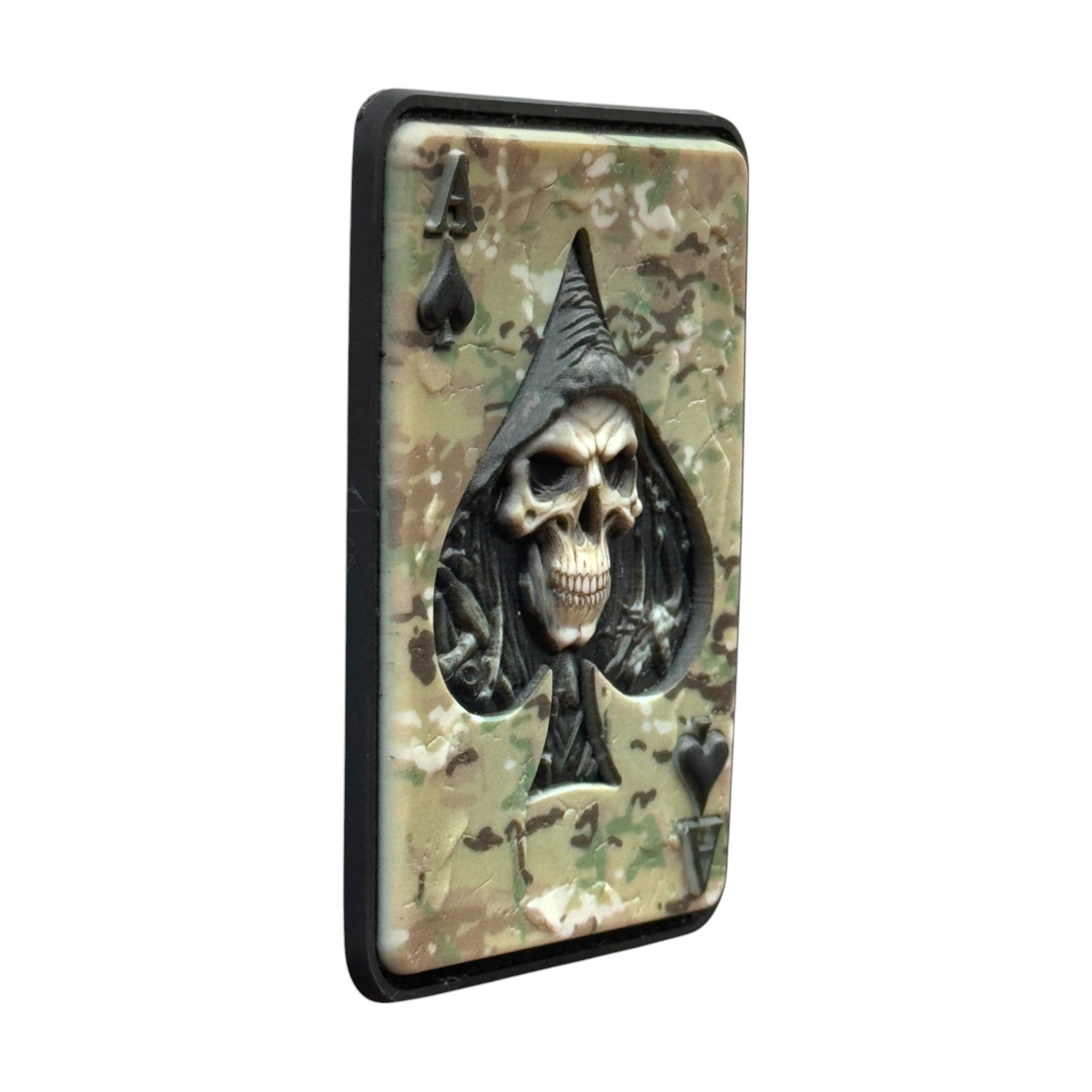 Ace of spades, green color with skull on a tactical military 3D PVC Hook and loop patch. Side view. Ideal for adding a unique and fun touch to your gear.