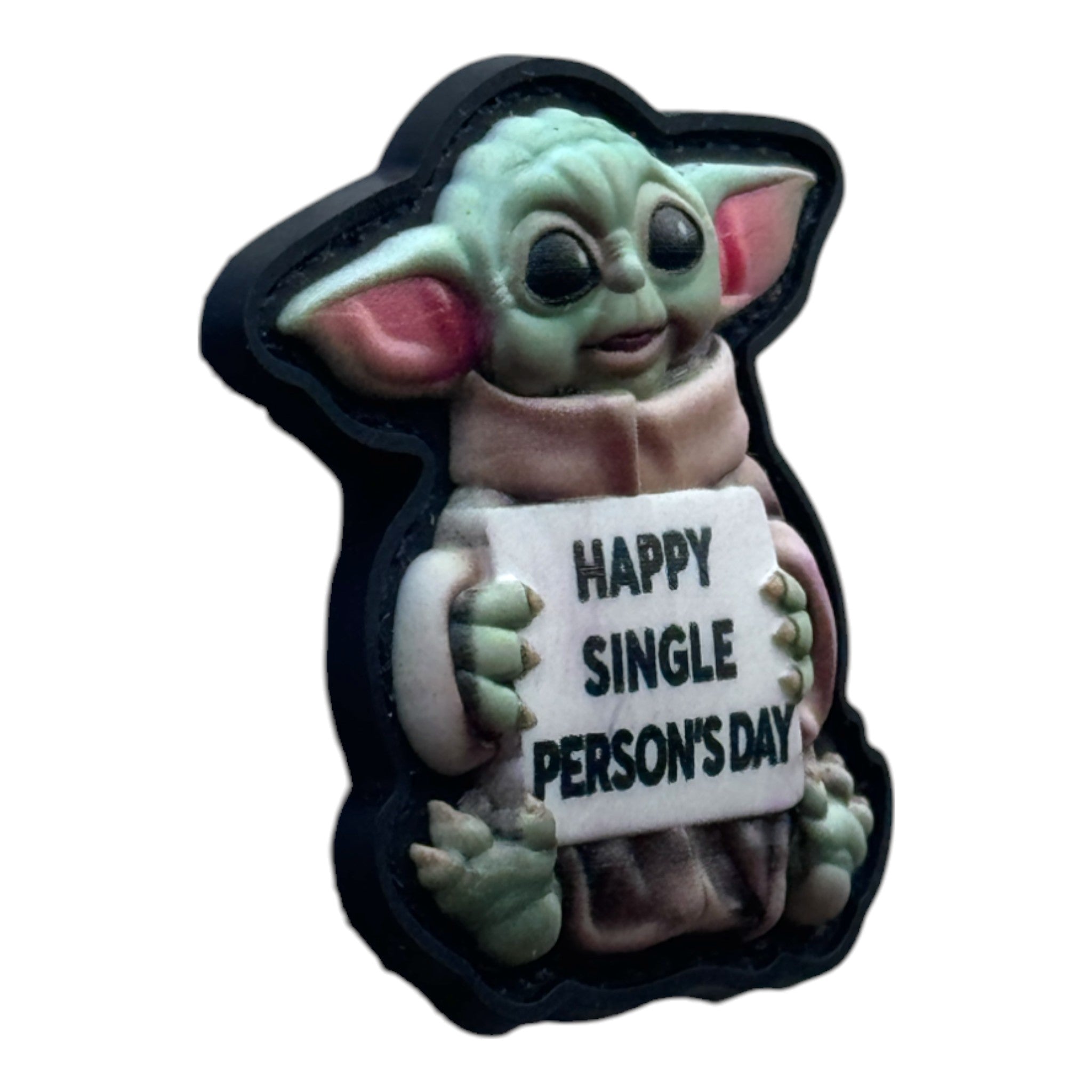 Baby Yoda holding a banner that says 'happy single person's day' on a tactical military 3D PVC Hook and Loop patch. Side view