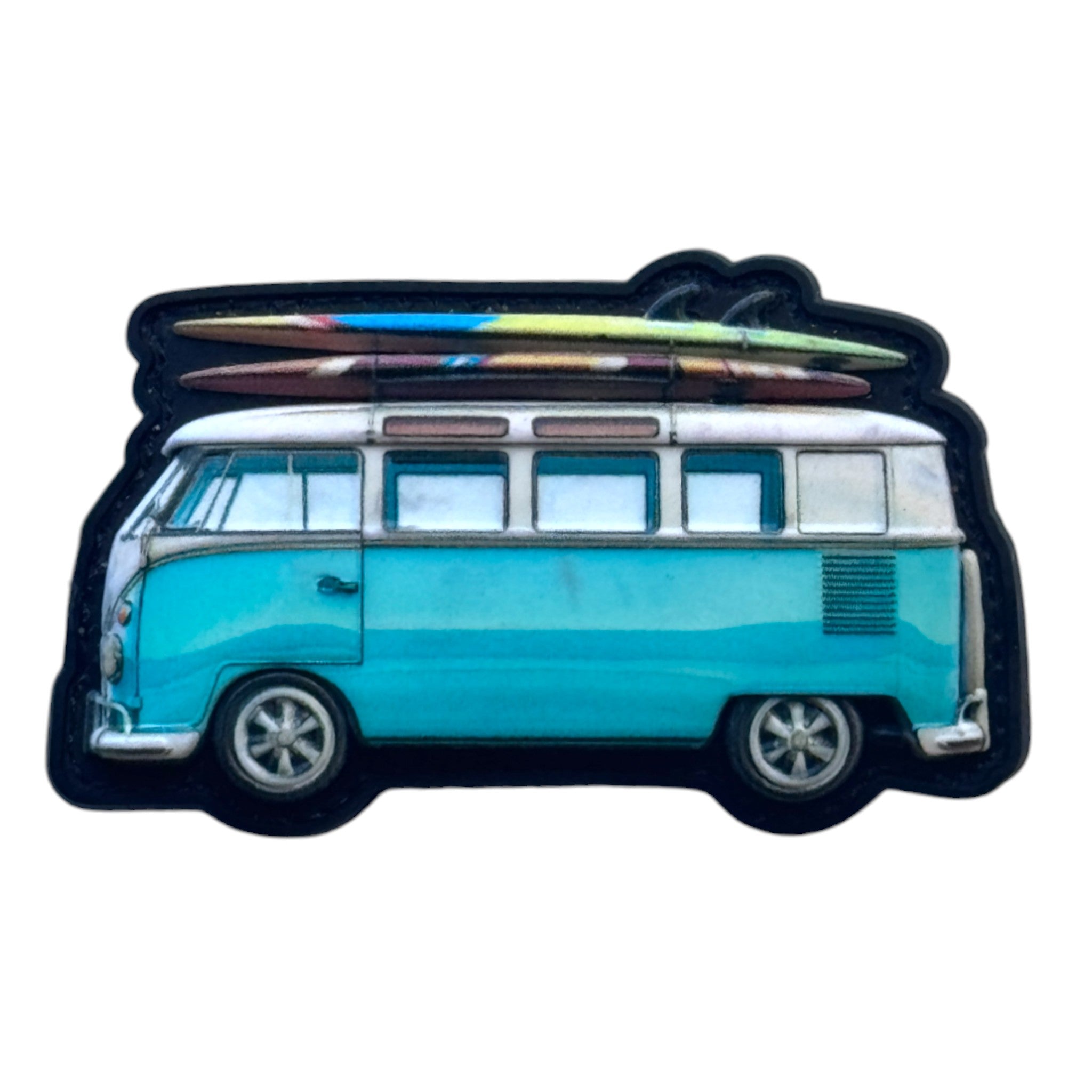 Blue surf bus with surfboards on top. 3D PVC Velcro patch with hook and loop backing, ideal for adding a unique and fun touch to your gear.