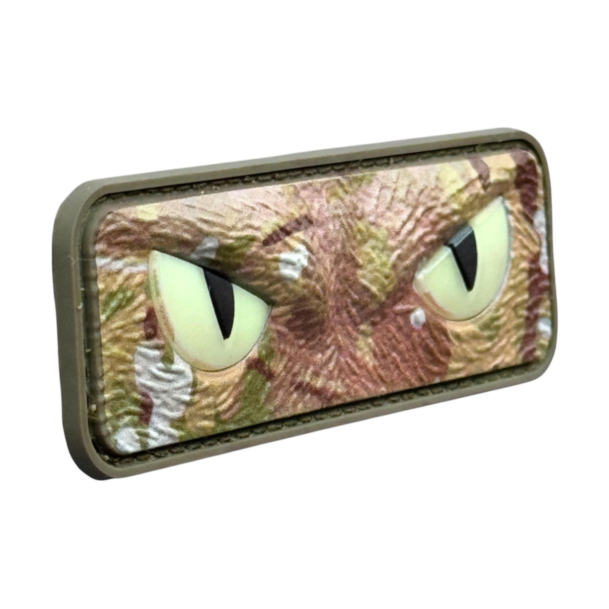 Brown camo cat eyes. Glow at night. 3D PVC Velcro patch with hook and loop backing. Side view