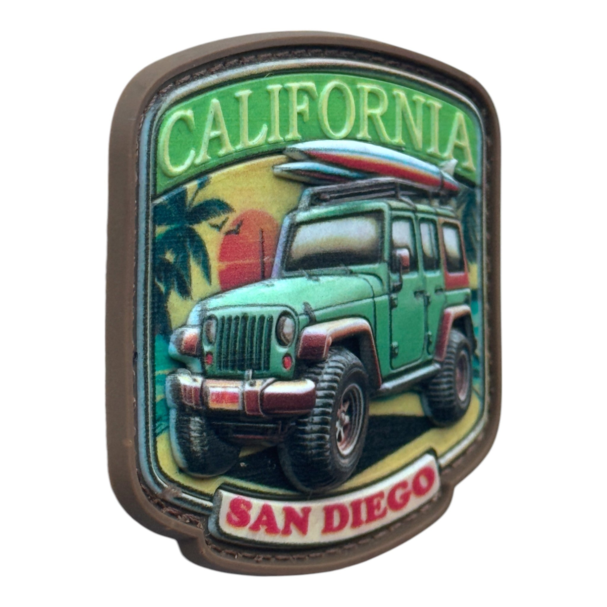Green jeep on a beach with the text 'California' and 'San Diego' 3D PVC Velcro patch with hook and loop backing. Side view