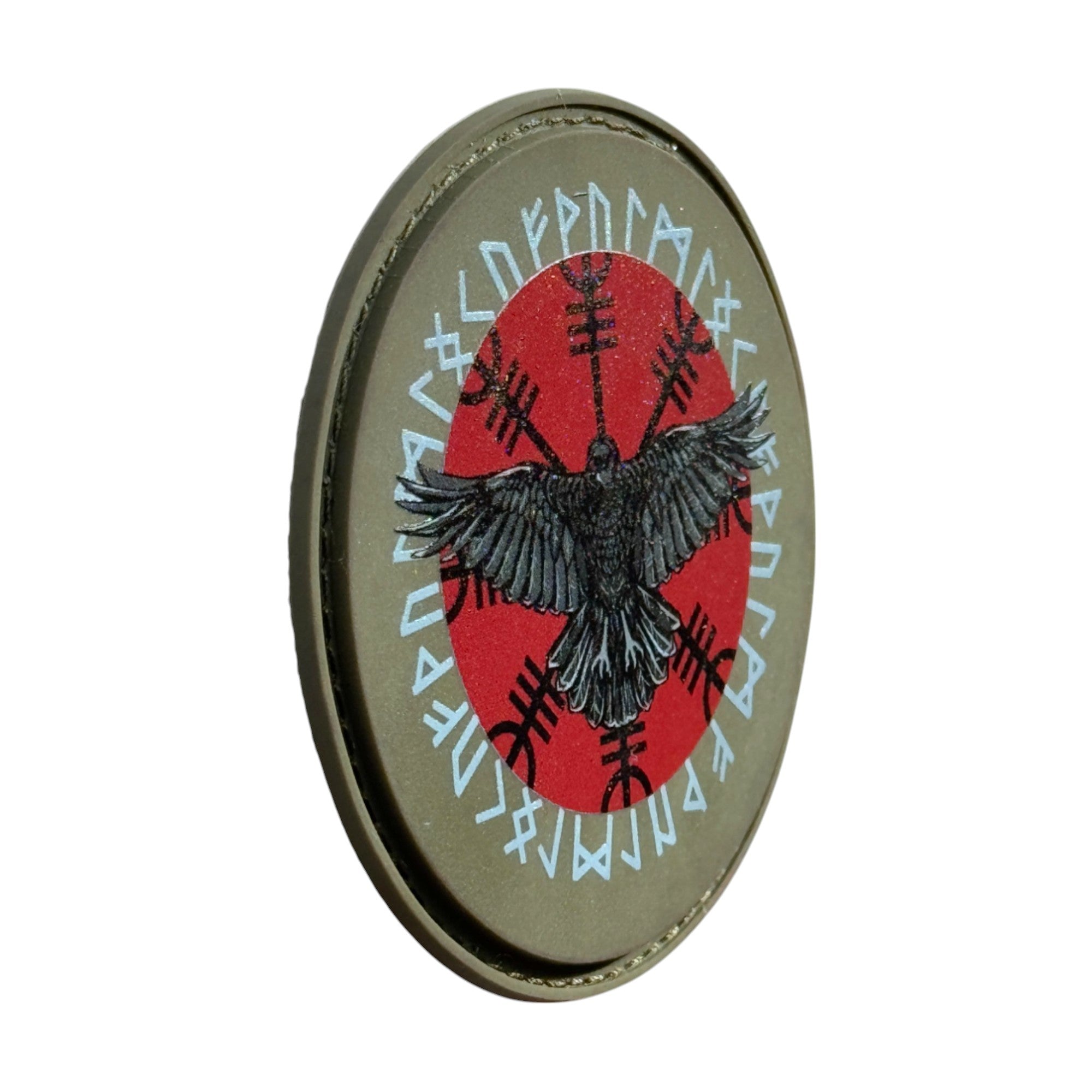 Viking raven on a green circle tactical military 3D PVC Hook and loop patch. Side view. Ideal for adding a unique and fun touch to your gear.