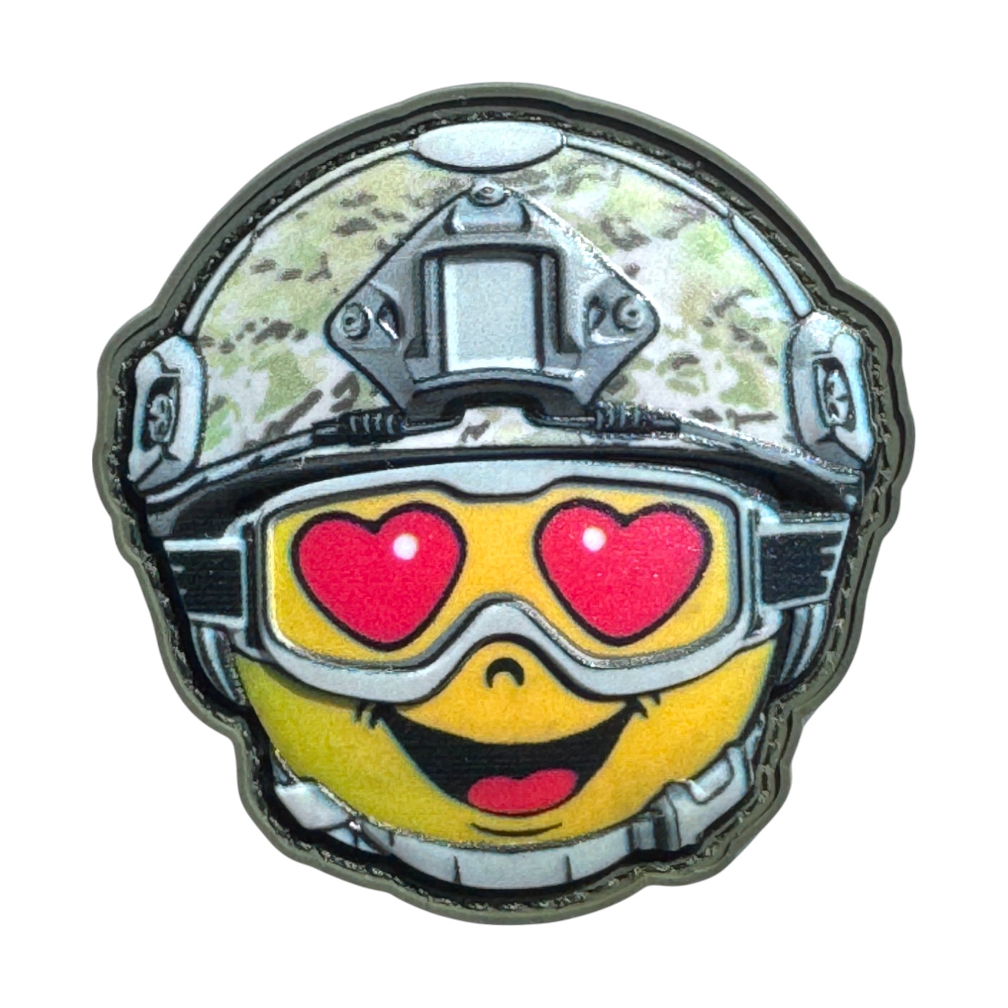 Yellow happy emoji with hearts in its eyes, wearing a combat helmet on a tactical military 3D PVC Hook and loop patch. Ideal for adding a unique and fun touch to your gear.