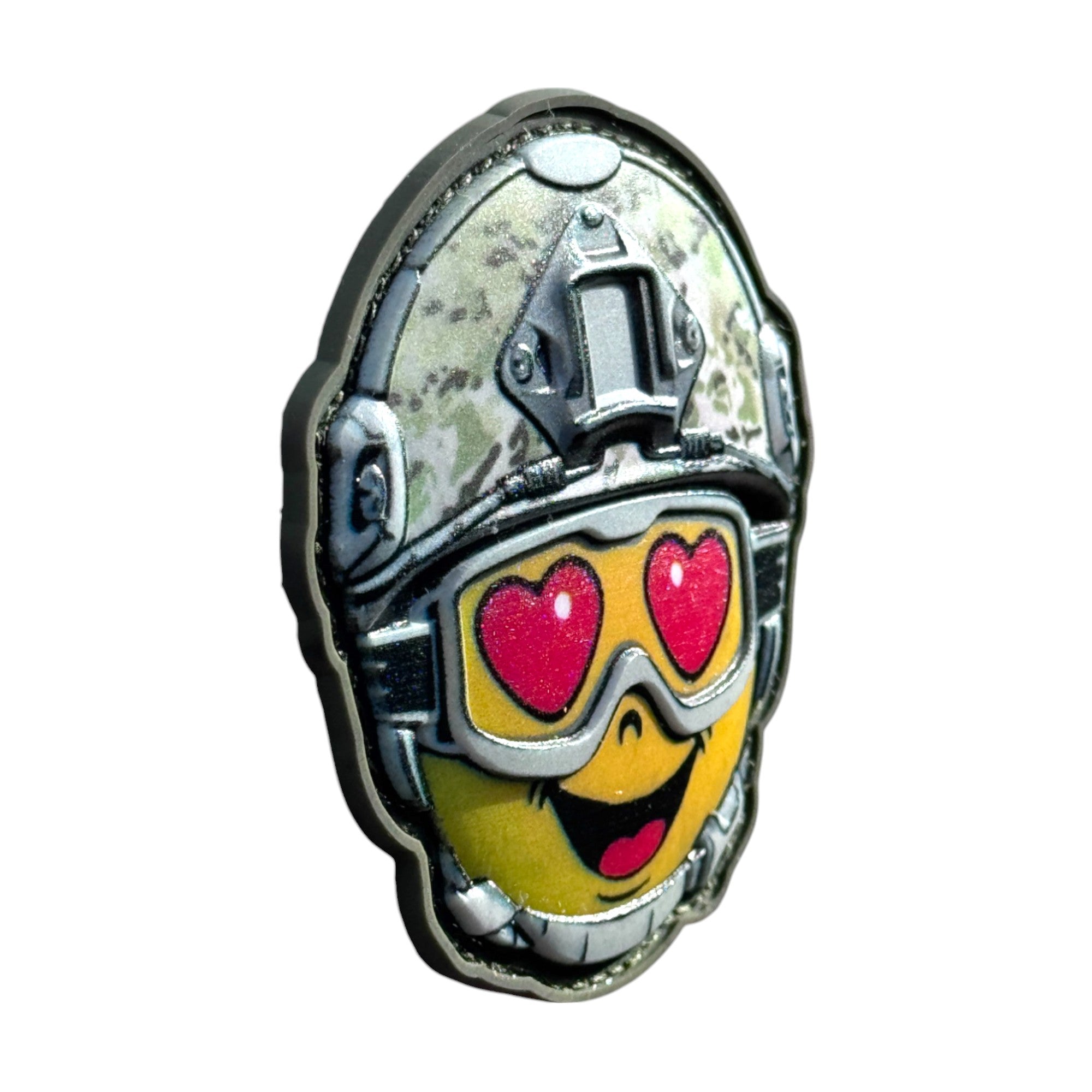 Yellow happy emoji with hearts in its eyes, wearing a combat helmet on a tactical military 3D PVC Hook and loop patch. side view. Ideal for adding a unique and fun touch to your gear.